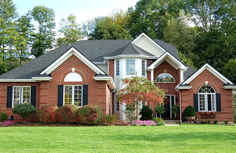 metal roof colors on brick house|matching brick and roof colors.